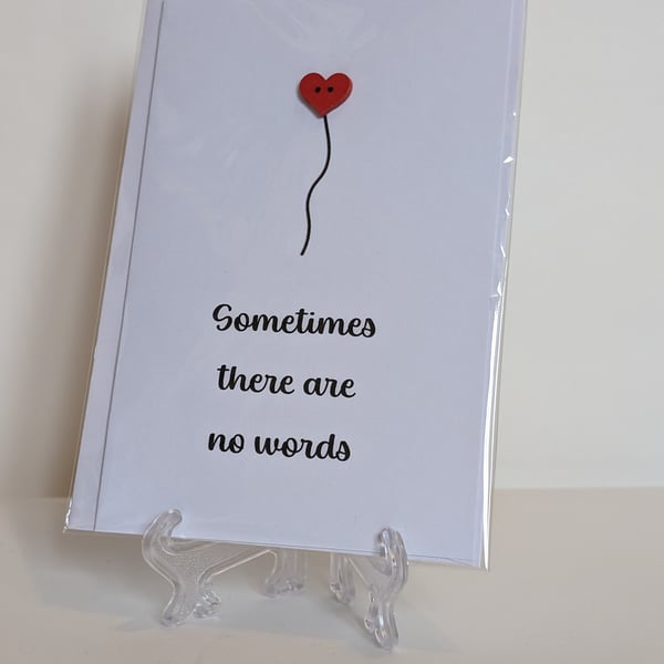 Sympathy card "Sometimes there are no words" with a red heart button 