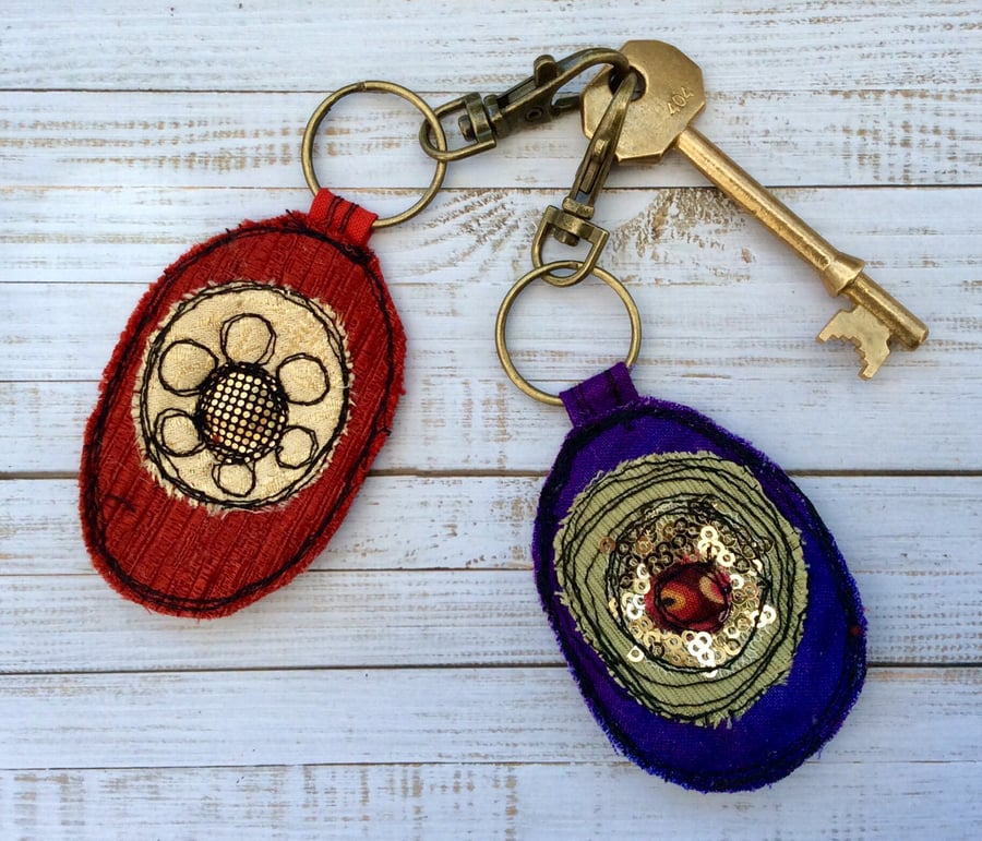 Upcycled embroidered Klimt style key ring or bag charm. 