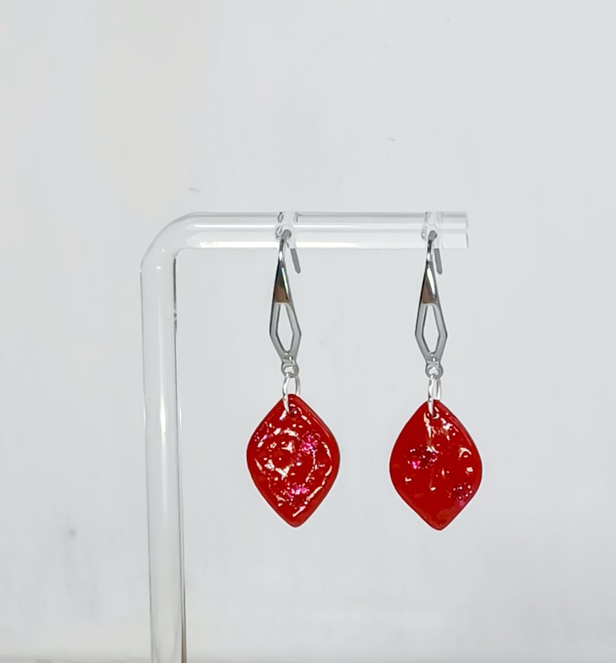 Red dimpled dot sparkle dangle earrings