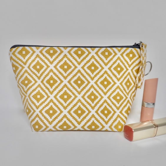 Make up bag in yellow ochre mustard print zipped pouch