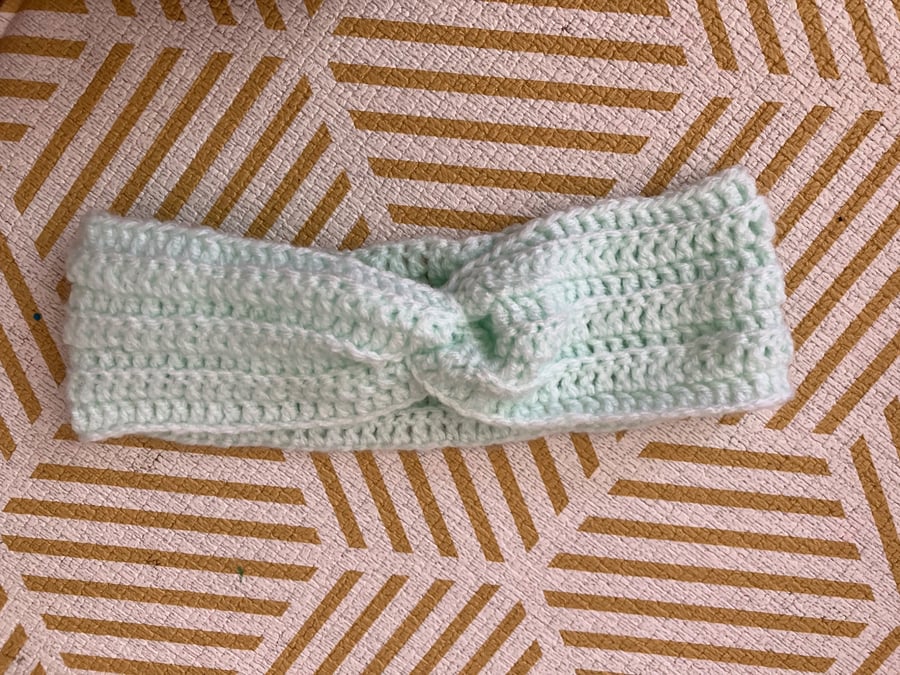 Comfy turquoise crochet headband with twist detail