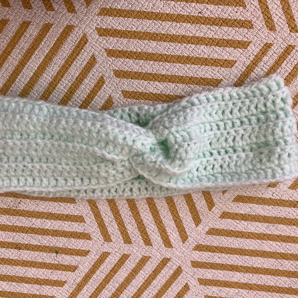 Comfy turquoise crochet headband with twist detail