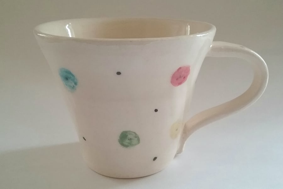 Hand thrown ceramic pottery spotty mug or cup