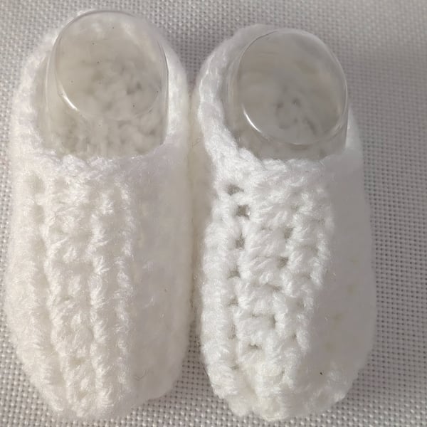 White baby shoes newborn