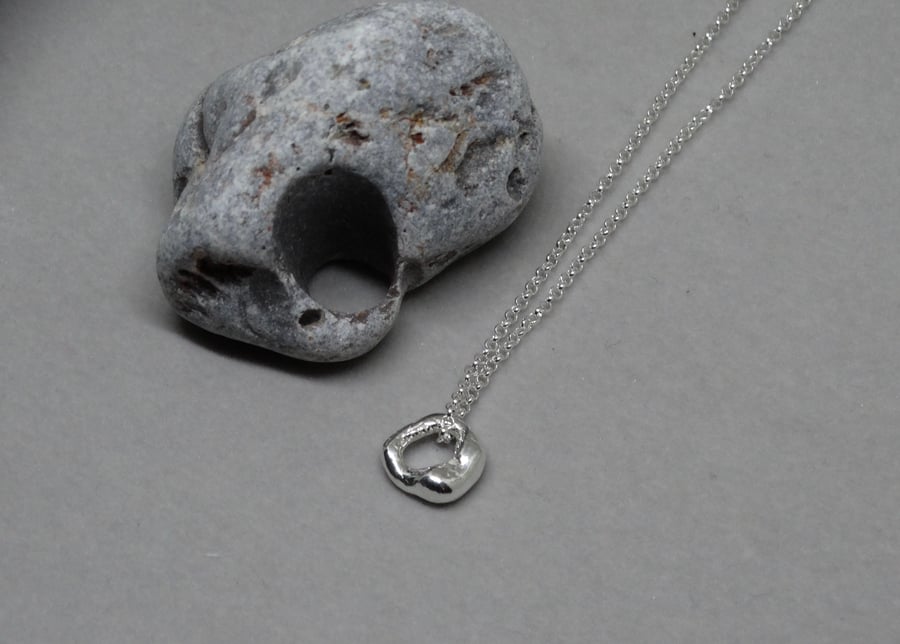 Silver hagstone pendant - molten silver - nugget 