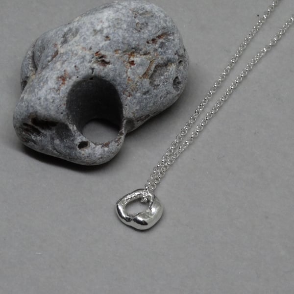 Silver hagstone pendant - molten silver - nugget 