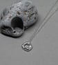 Silver hagstone pendant - molten silver - nugget 