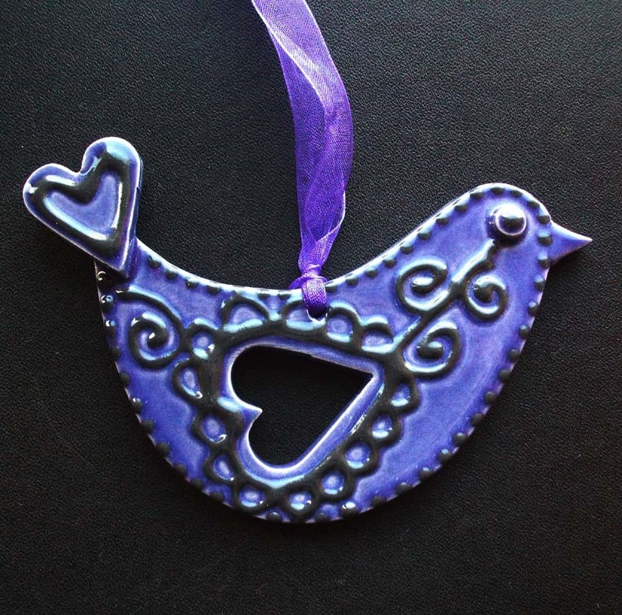ceramic folk art purple bird decoration 