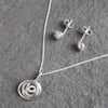 Sterling silver pendant & earring set - twist of silver