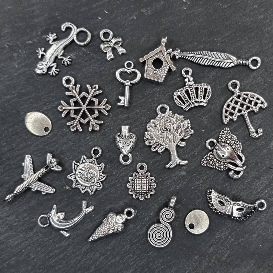 20 Antiqued silver tone mixed theme charms 