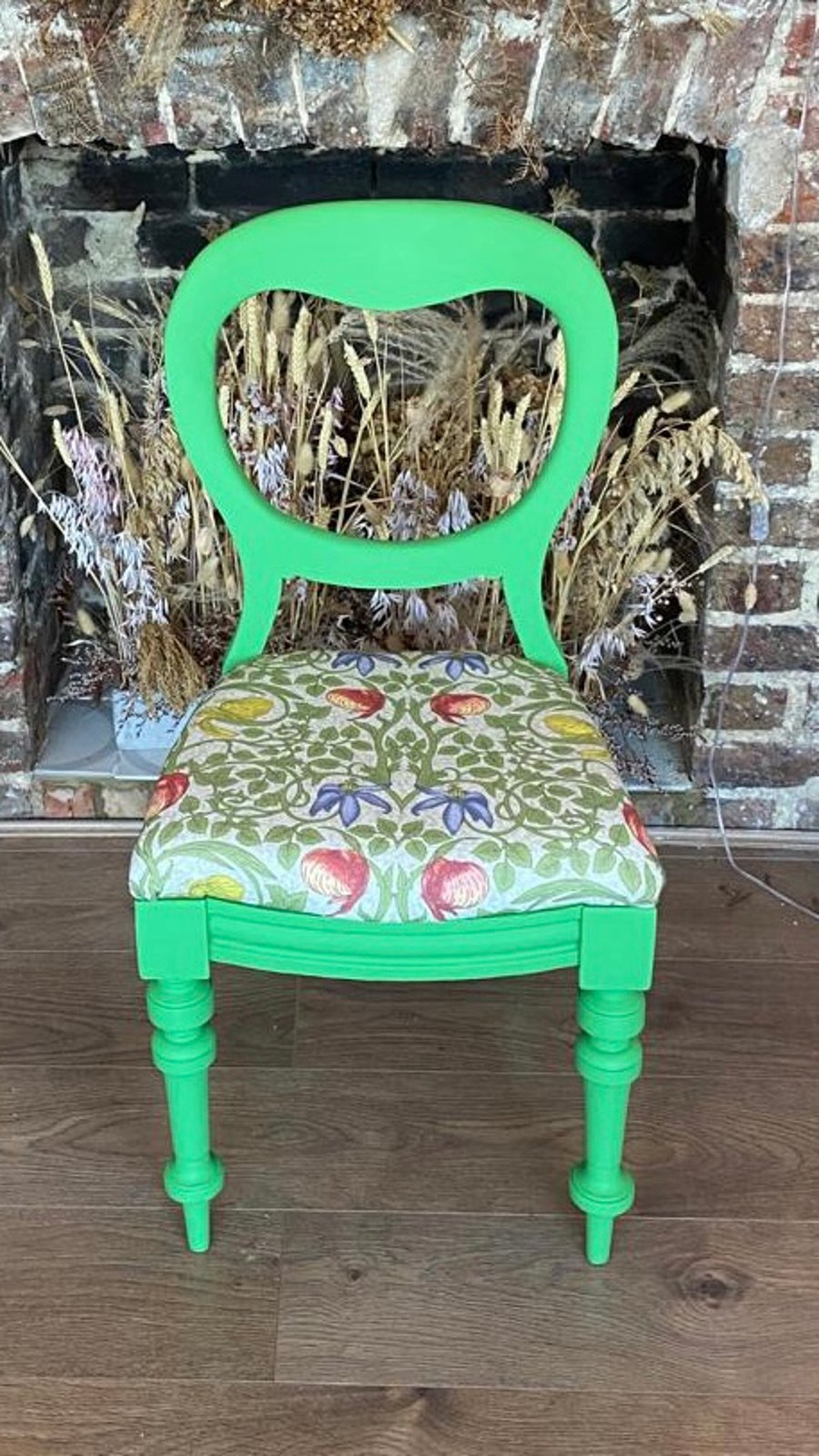Upholstered colourful mismatched chairs