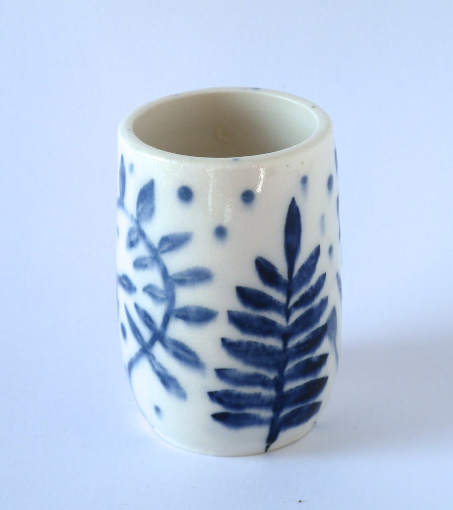 A pretty little porcelain posy vase made by Linda in her pottery in Winchester