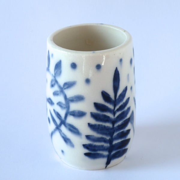 A pretty little porcelain posy vase made by Linda in her pottery in Winchester