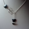 HEMATITE BUTTERFLY,  BIRD AND LEAF LARIAT NECKLACE.  703