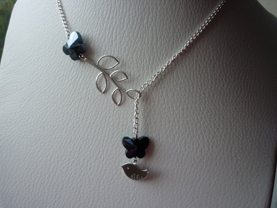 HEMATITE BUTTERFLY,  BIRD AND LEAF LARIAT NECKLACE.  703