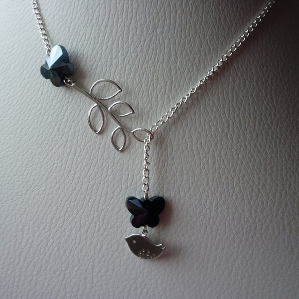 HEMATITE BUTTERFLY,  BIRD AND LEAF LARIAT NECKLACE.  703