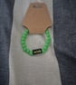 A green bracelet - Image 2