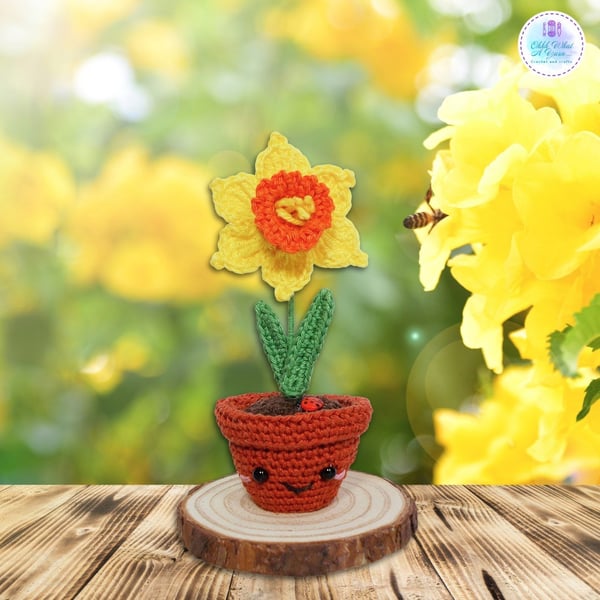 Crochet daffodil in smiley flower pot. Crochet daffodil. Crochet flower pot.
