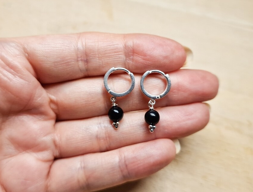 Black onyx huggie hoop earrings. Reiki jewelry uk. December birthstone