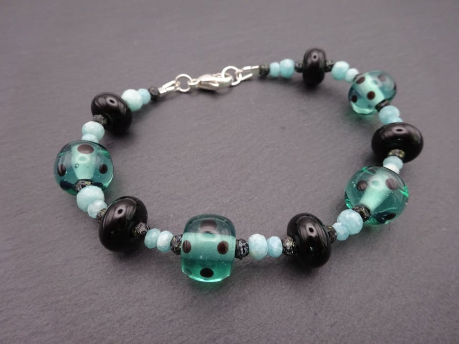 lampwork glass beaded bracelet, green and black