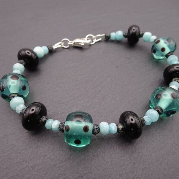 lampwork glass beaded bracelet, green and black