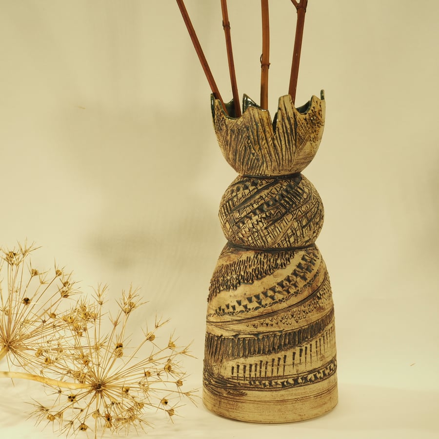 Textured vase with sphere