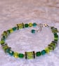 Crystal bracelet in warm greens