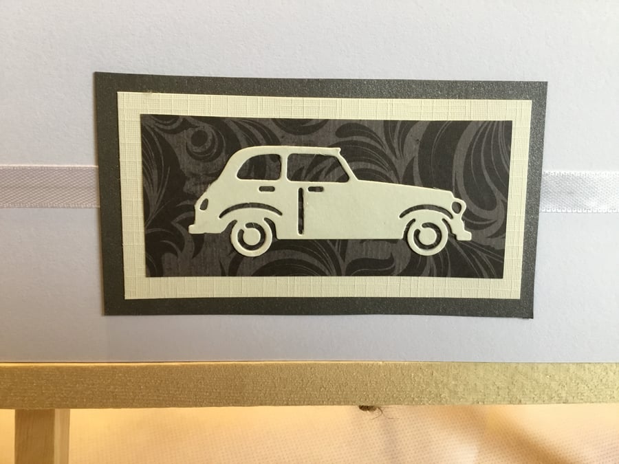 Die cut car card