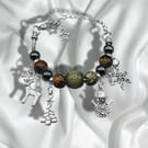 Christmas charm bracelet with traditional colours of red and green 