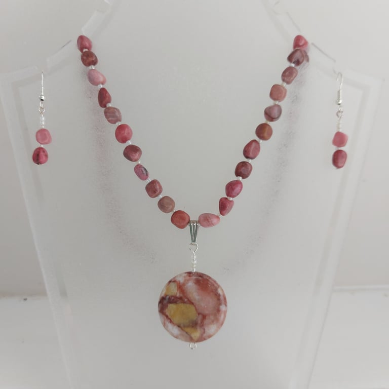 Gemstone necklace and earrings set. Pink rhodochrosite beads and pendant