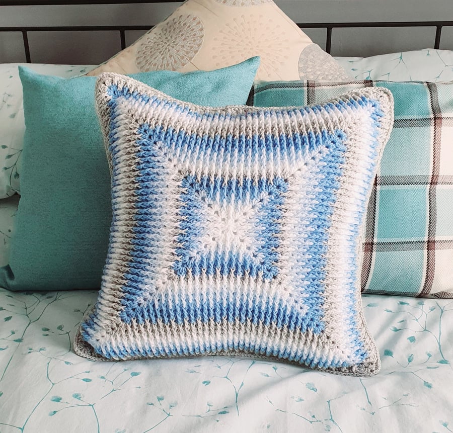 Blue tones crochet cushion