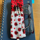 Elasticated pen and glasses holder