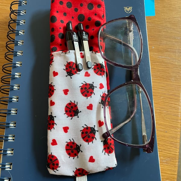 Elasticated pen and glasses holder