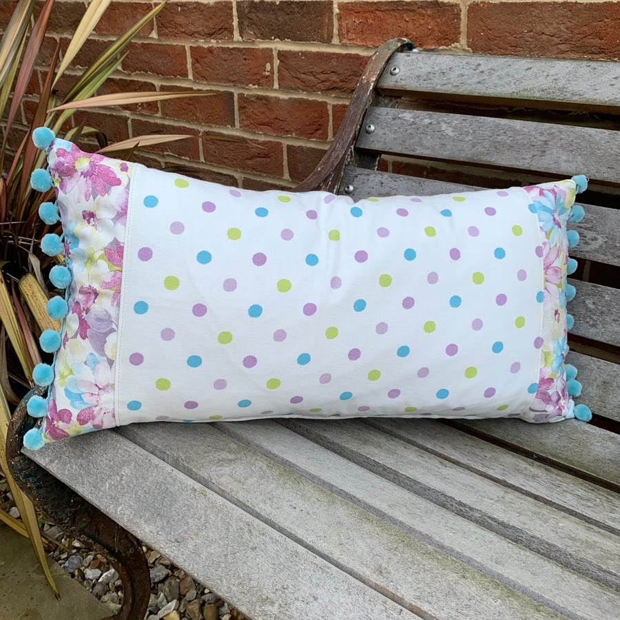 Spots and flowers cushion