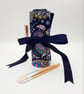 Navy blue make up wrap with colourful pattern.  - Image 1