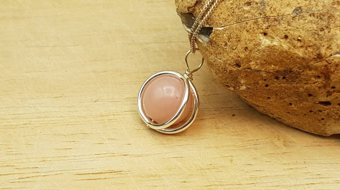 Minimalist pink Opal circle pendant. Sterling silver. October birthstone