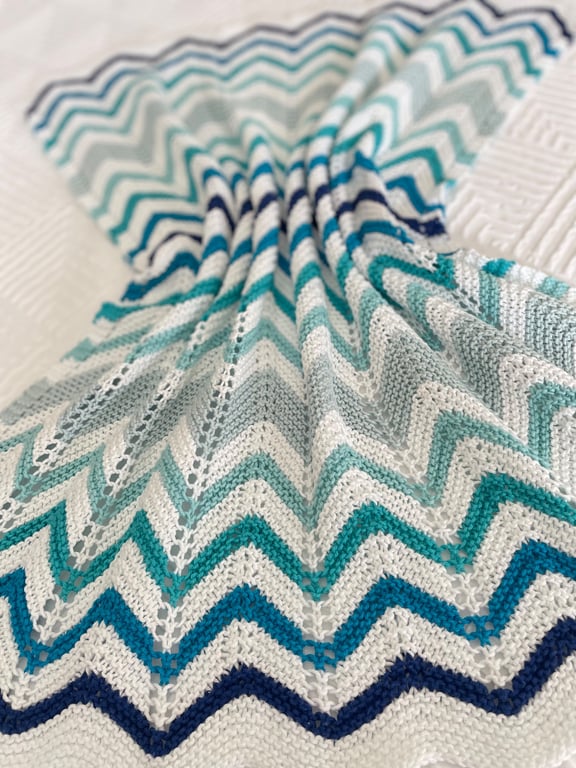 Shades of blue and aqua baby blanket, hand knitted in 100% cotton yarn.