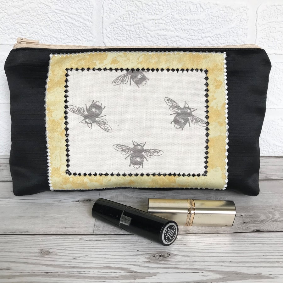 Large cosmetic bag, make up bag in black with bumble bees print panel