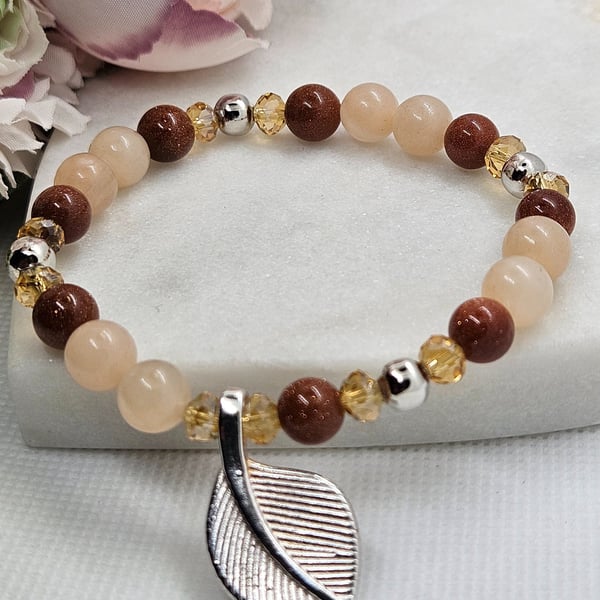 Goldstone and aventurine silver leaf charm stretch bracelet