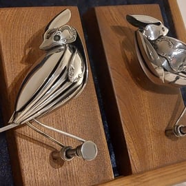 A Pair of Vintage Flatware Crested Tits, mounted on reclaimed Elm