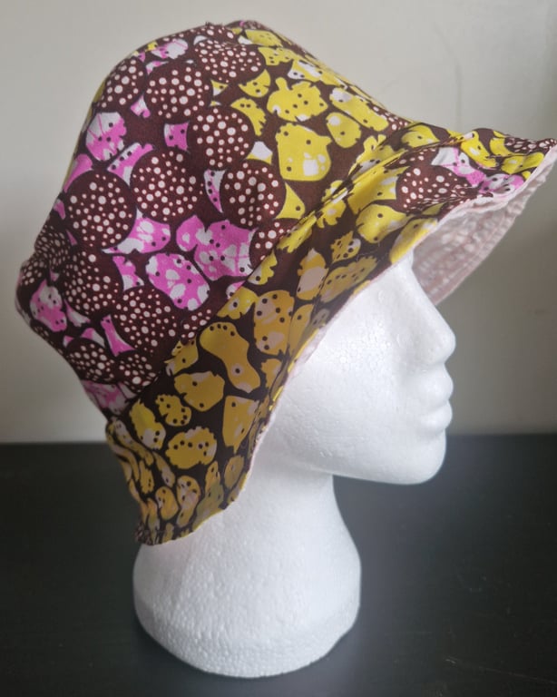 Handcrafted reversible pink & yellow batik patterned summer festival bucket hat