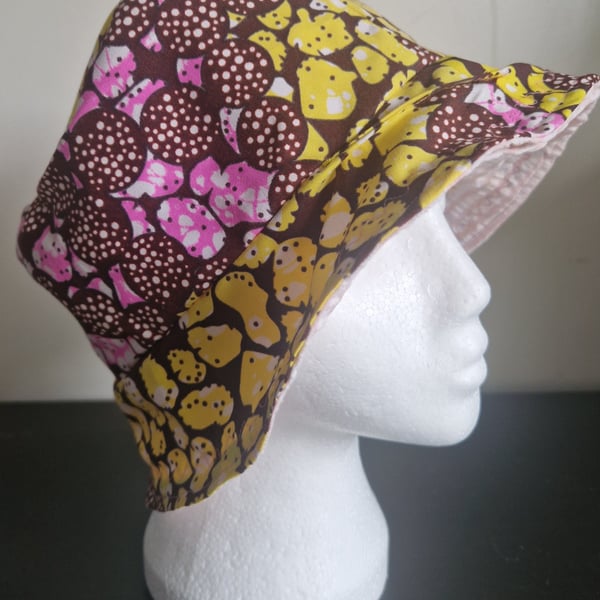 Handcrafted reversible pink & yellow batik patterned summer festival bucket hat