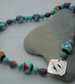 Peruvian handpainted bead necklace with glass & Magnesite beads - Image 1