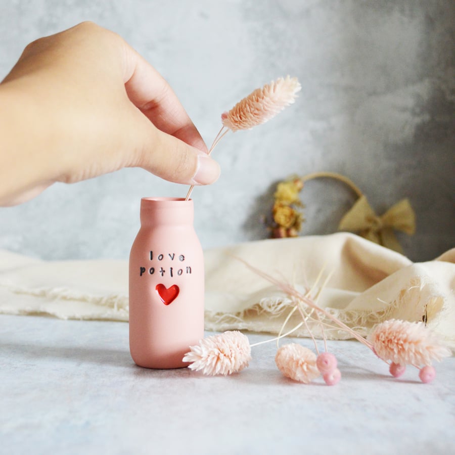 Small Pastel Pink Love Potion Bottle with a Red Heart