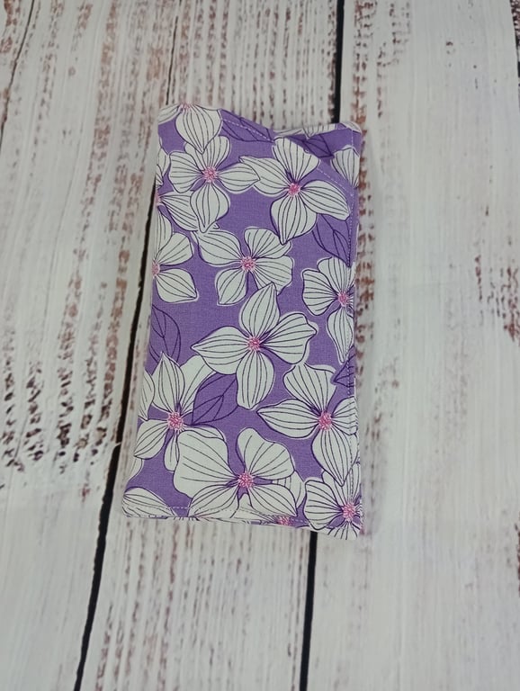 Purple padded glasses case with white flowers
