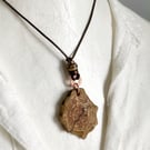 Carved Cherry Wood Pendant Inlaid With Copper On A Leather Cord
