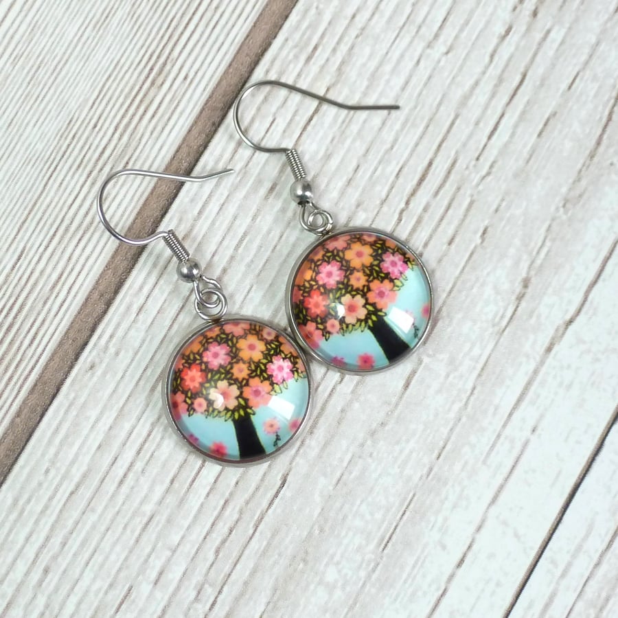 Cute earrings with a blossom filled tree design.  