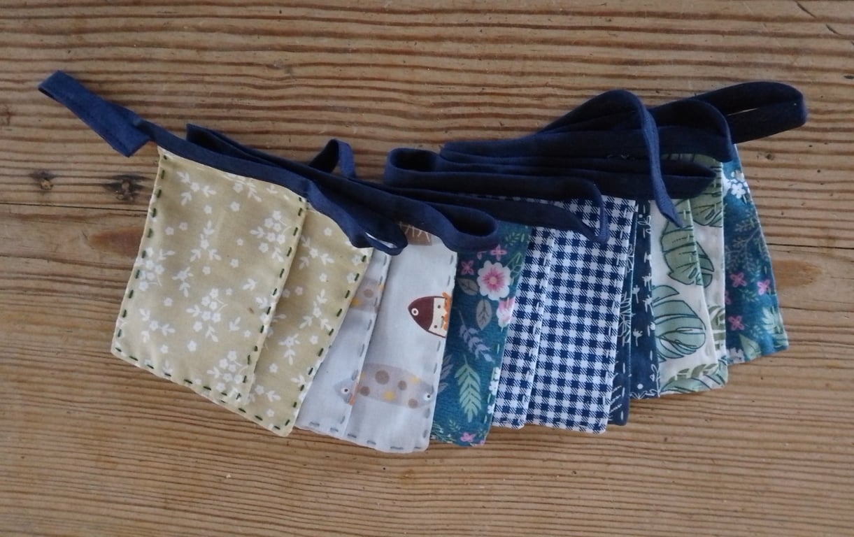 Mini bunting handmade decoration in a blue and green colourway.