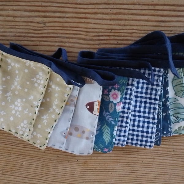 Mini bunting handmade decoration in a blue and green colourway.