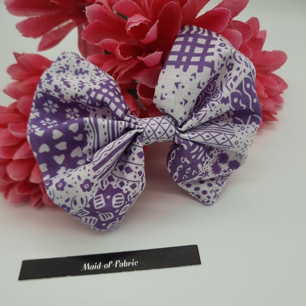 Hair bow slide clip in purple and white patterned fabric. 3 for 2 offer.  